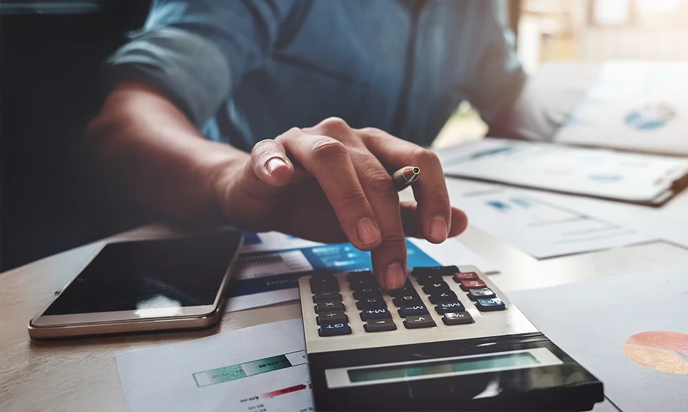 person using a calculator