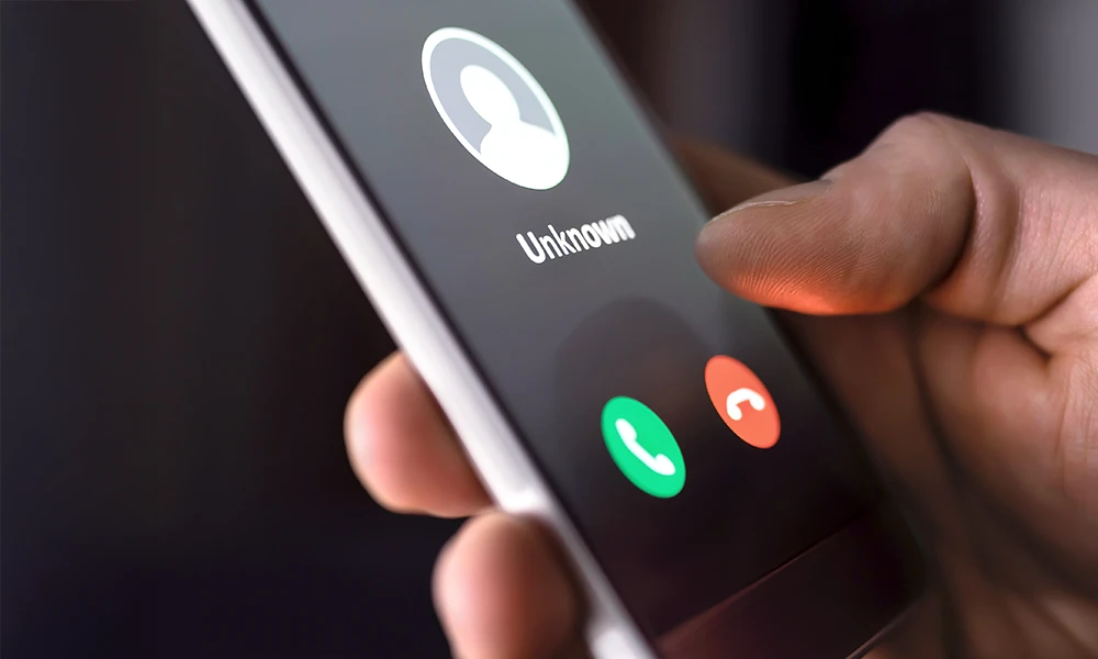 mobile phone showing unknown incoming call