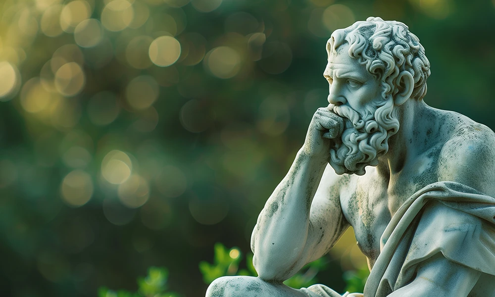 statue of a Greek philosopher thinking