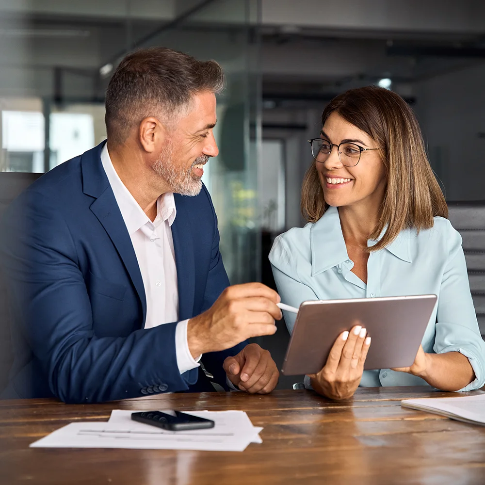 Two colleagues of professional business people working together