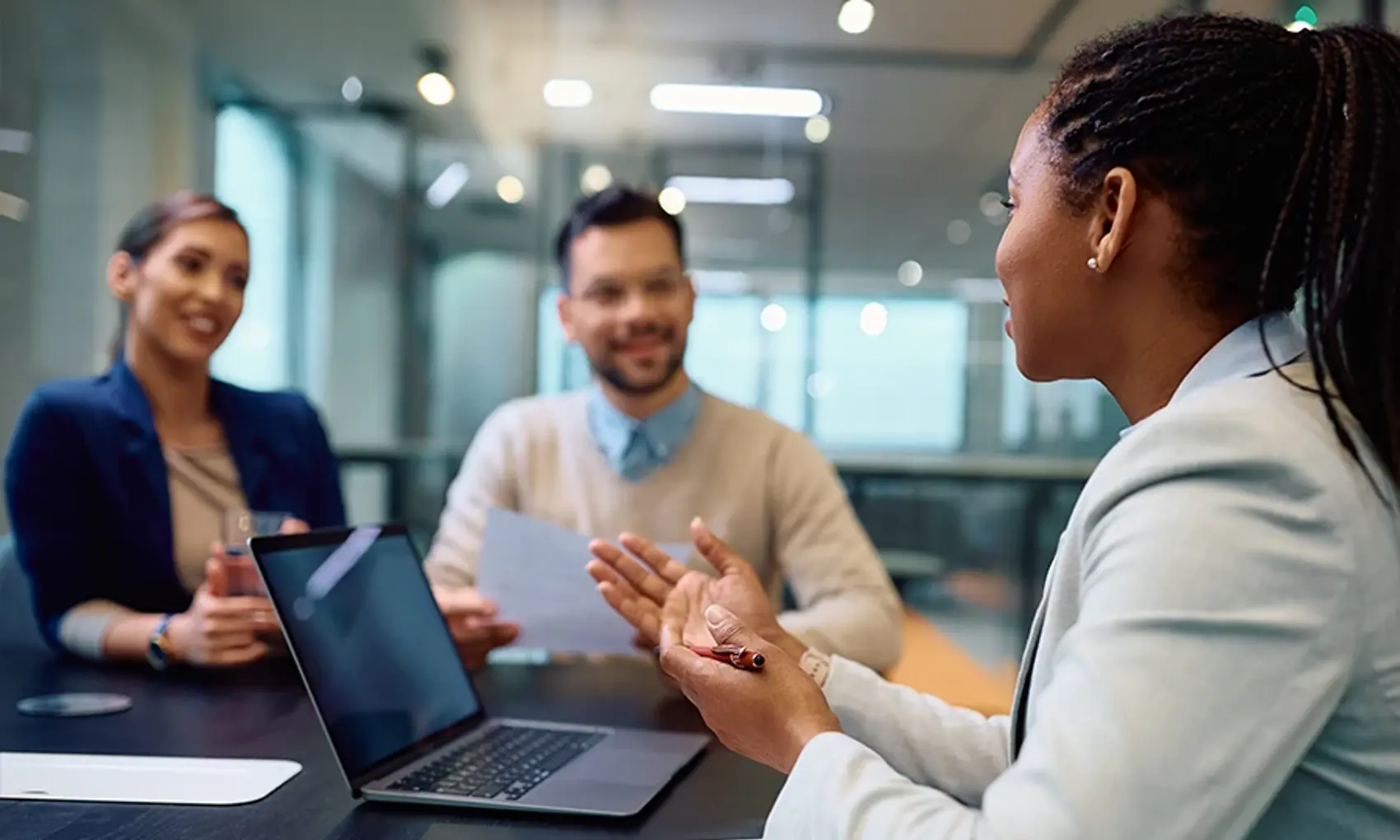 woman talking to a couple