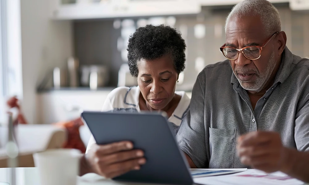 man and woman reviewing finances