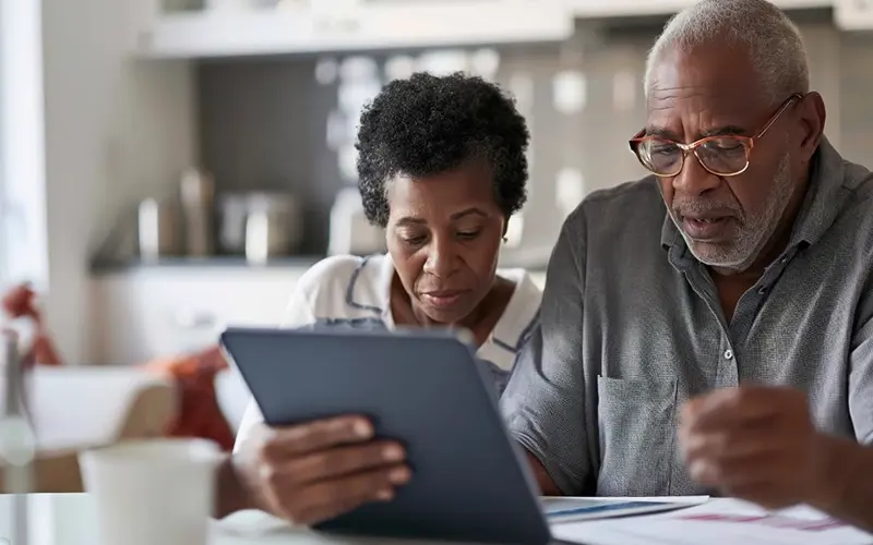 man and woman reviewing finances