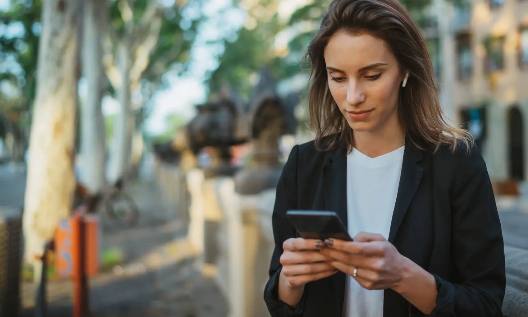 Woman on a phone outside