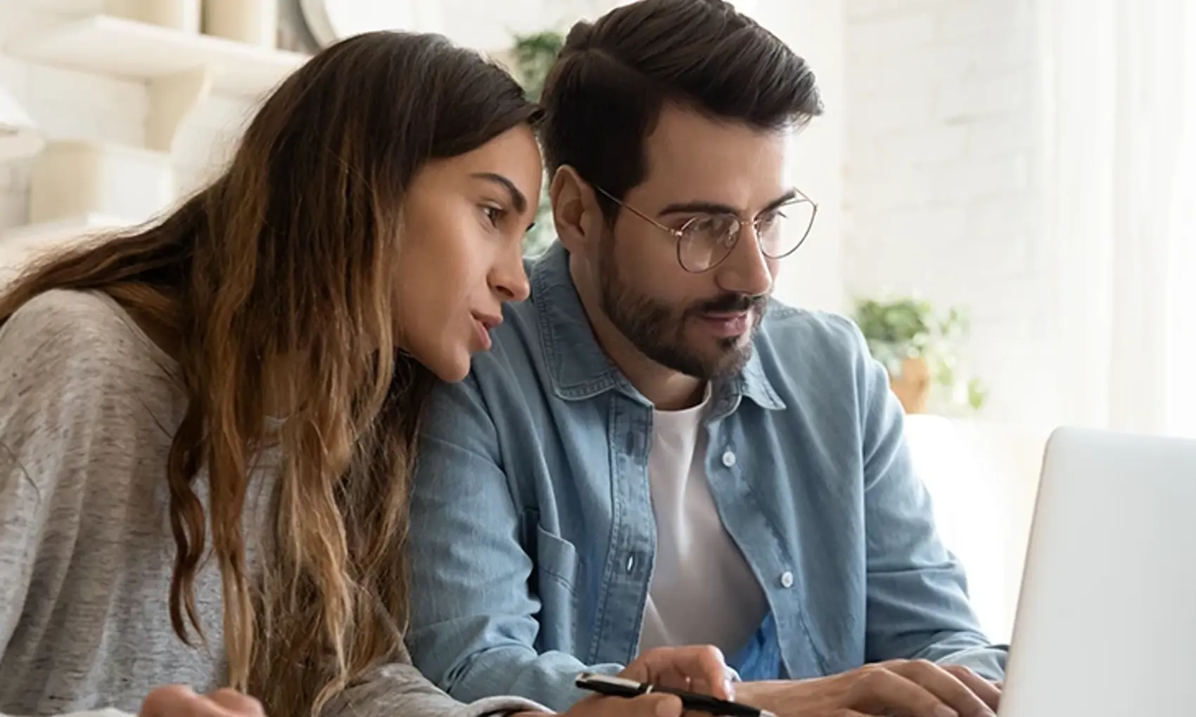 Man and woman using a computer
