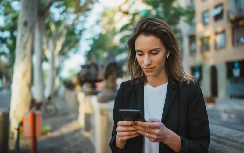 Woman on phone outdoors