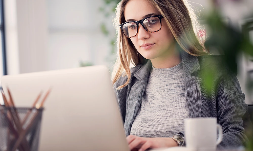 young business woman on laptop