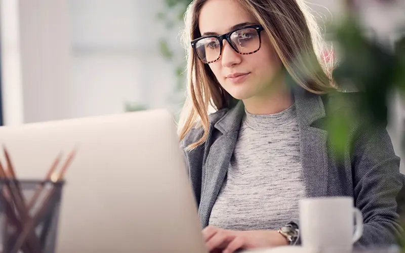 young business woman on laptop