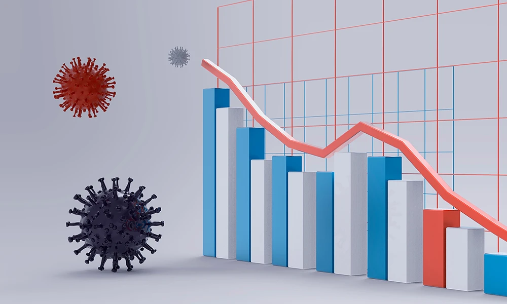 spherical coronavirus mass with protruding spikes next to declining economic chart  