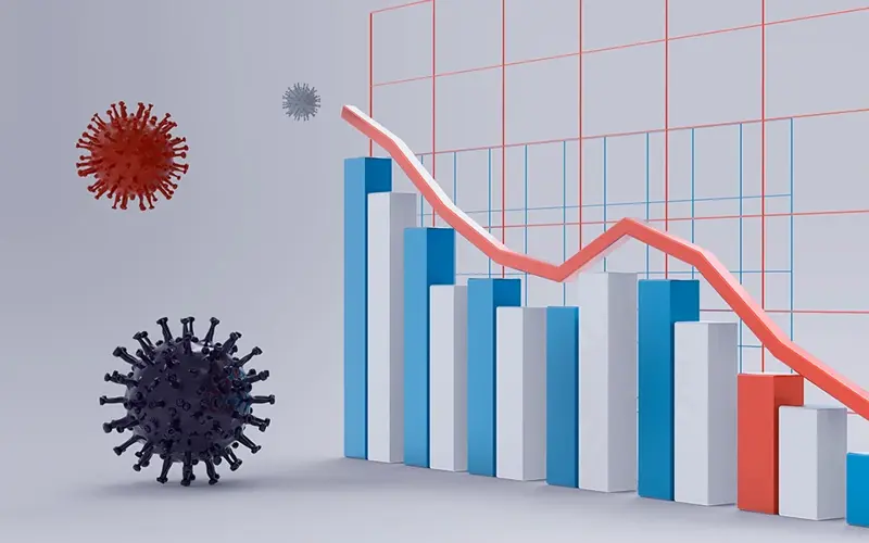 spherical coronavirus mass with protruding spikes next to declining economic chart  