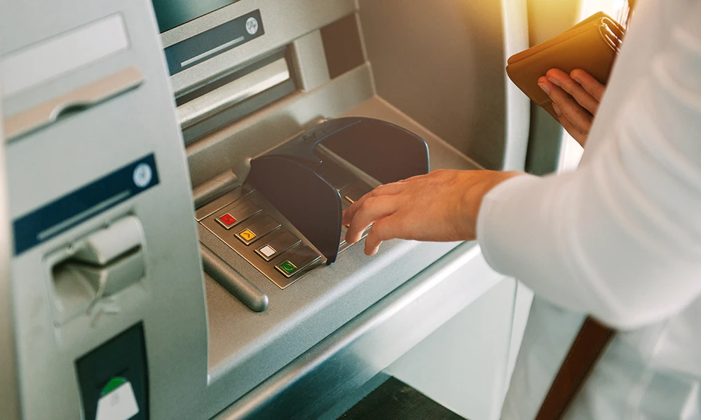 person using ATM machine