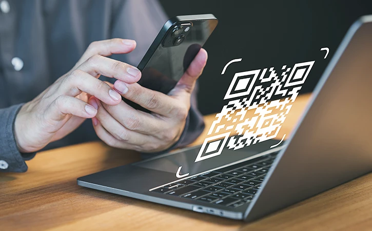 person scanning QR code