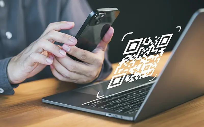 person scanning QR code