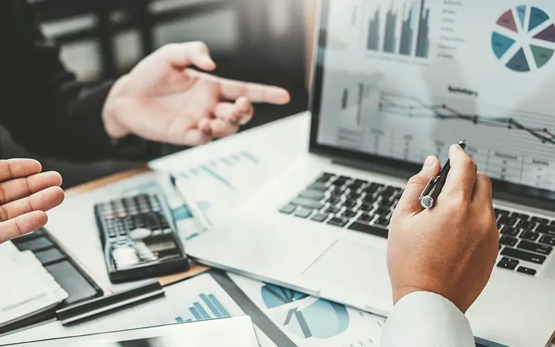 people reviewing finances