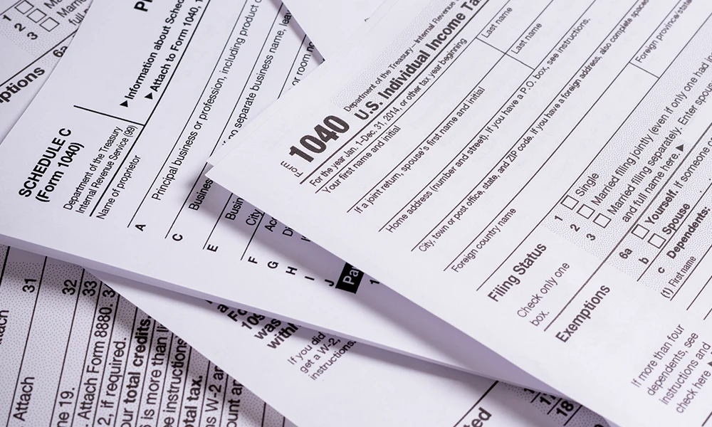 pile of paper tax forms