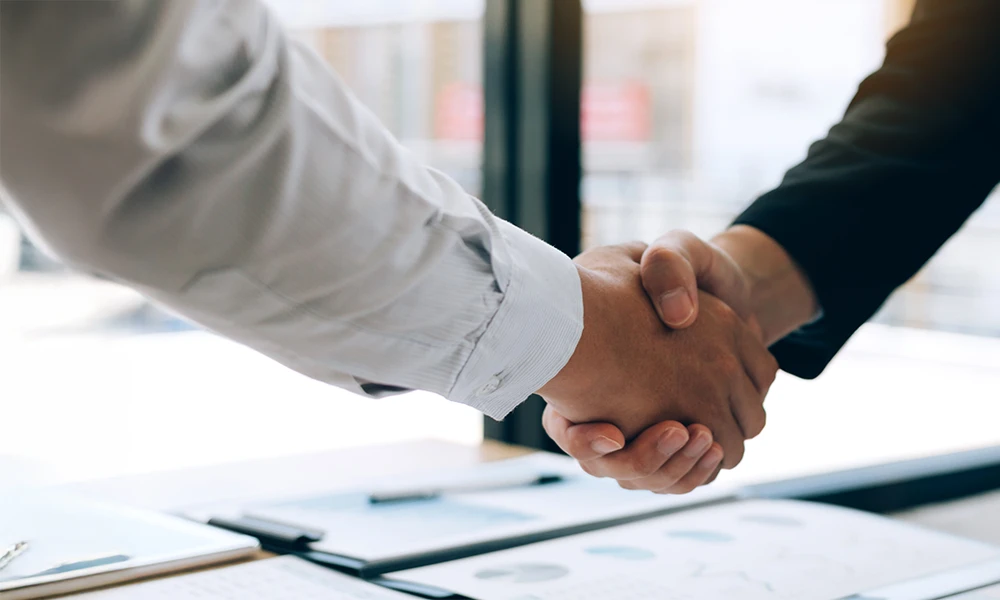 hands shaking over paperwork