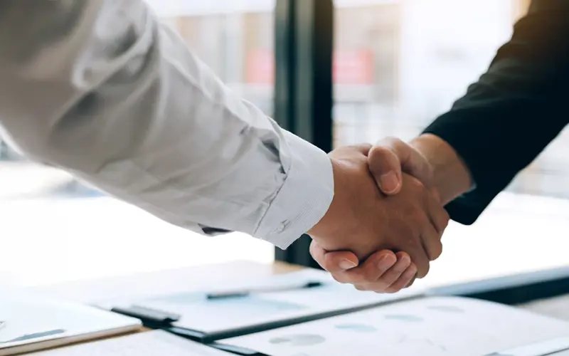 hands shaking over paperwork